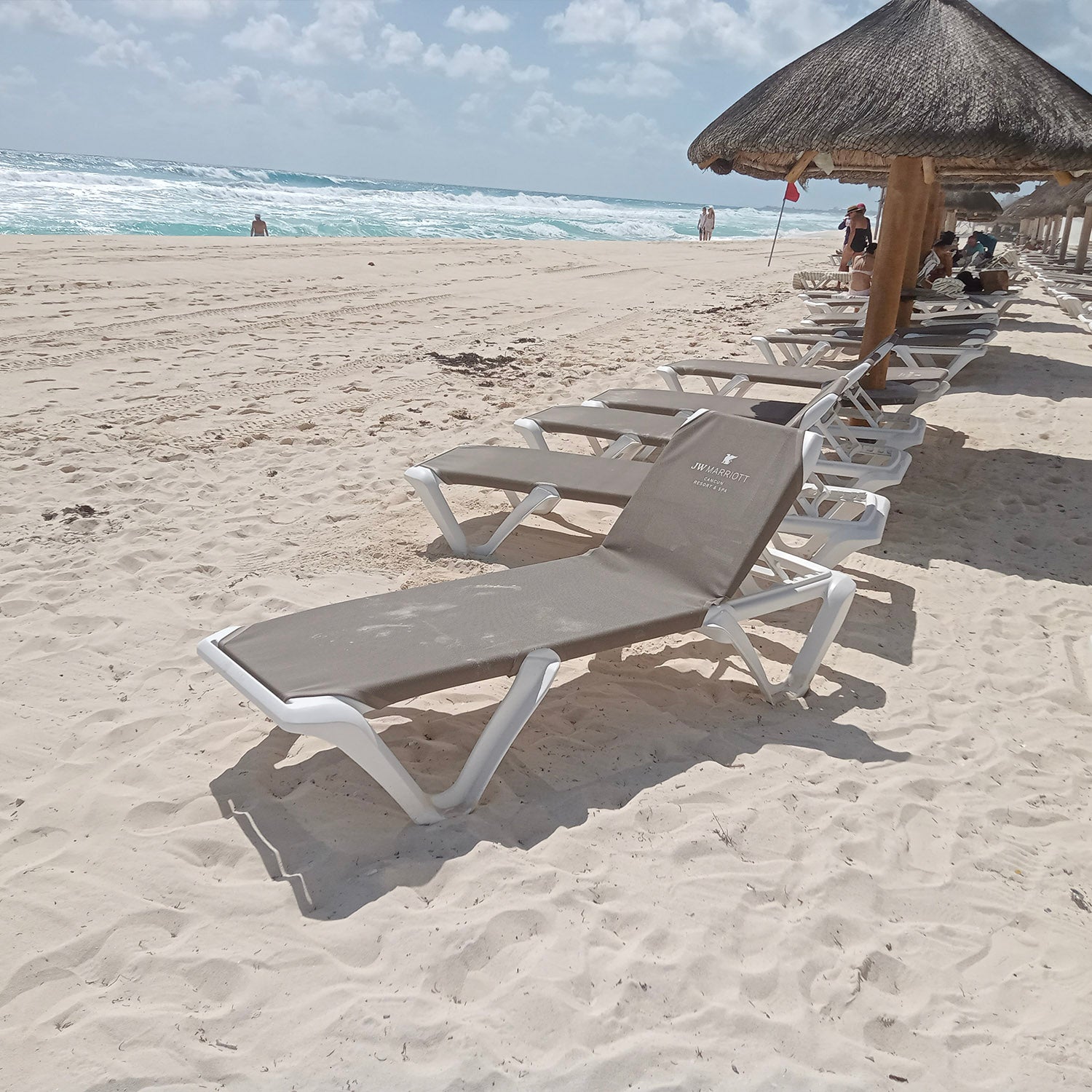 Nautical Pro Chaise Lounge on the beach at the JW Marriot in Cancun, Mexico as the ocean looks on in the background